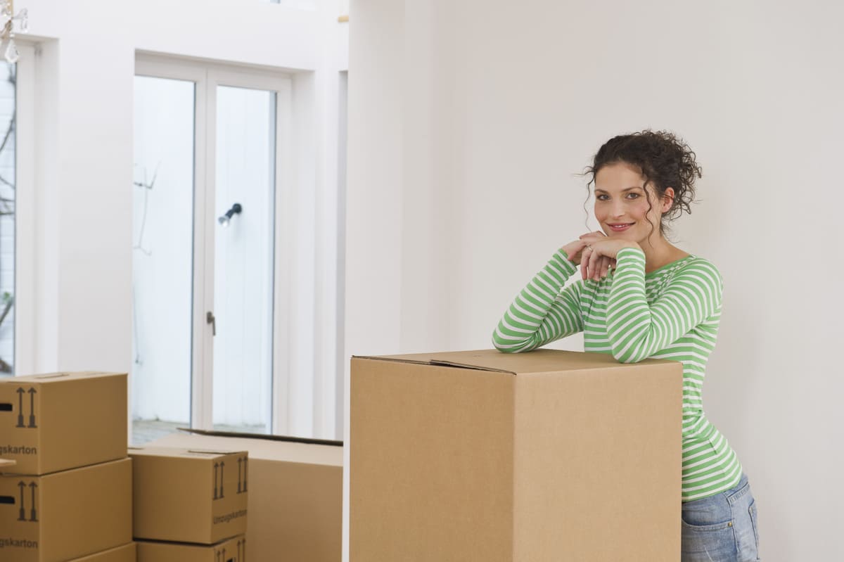 A woman moving into a new rental property