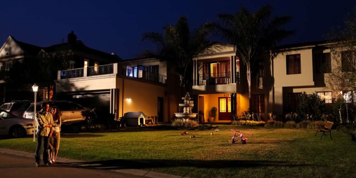 A couple walking on the street of a suburban neighborhood - featured_image