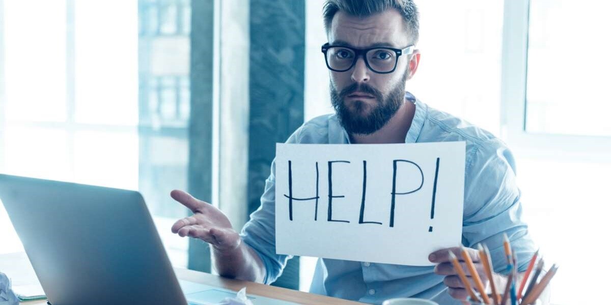 Frustrated young man holding piece of paper and asking for help  - featured_image