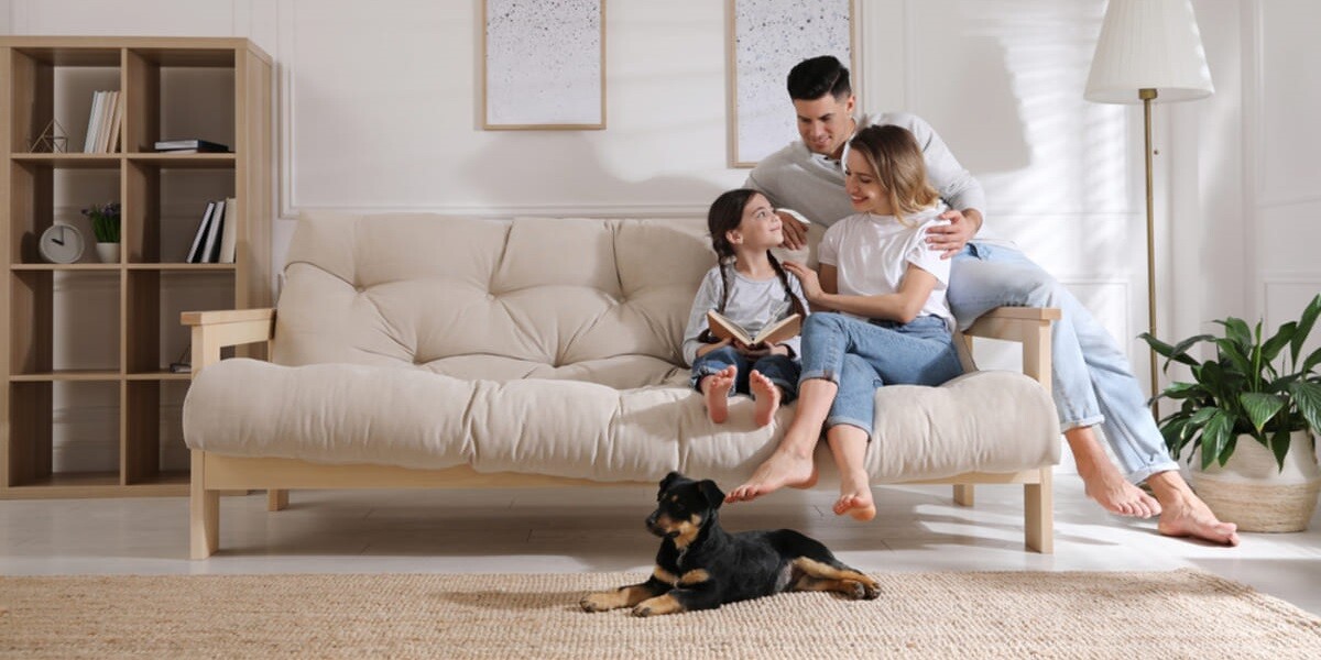 Happy tenants sitting on the couch