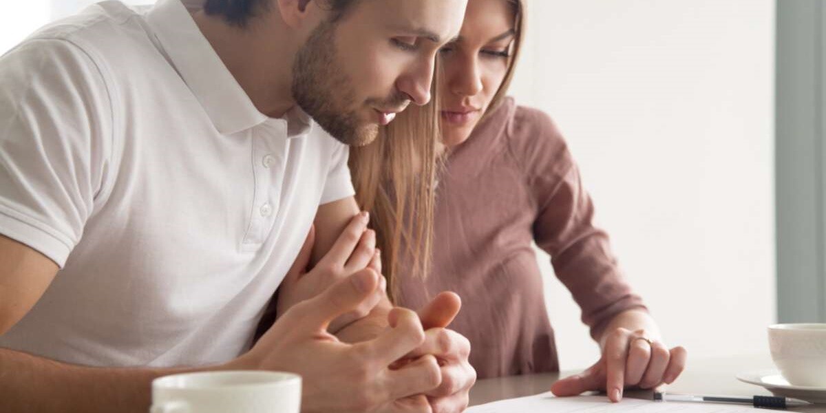 Property owners reading a lease agreement 