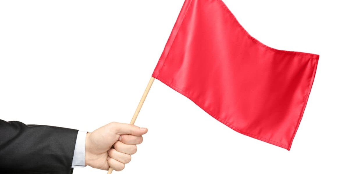 holding a red flag